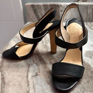 CHRISTIAN LOUBOUTIN
Etri Wood Leather Slingback Sandals